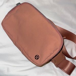 Pink Lululemon belt bag